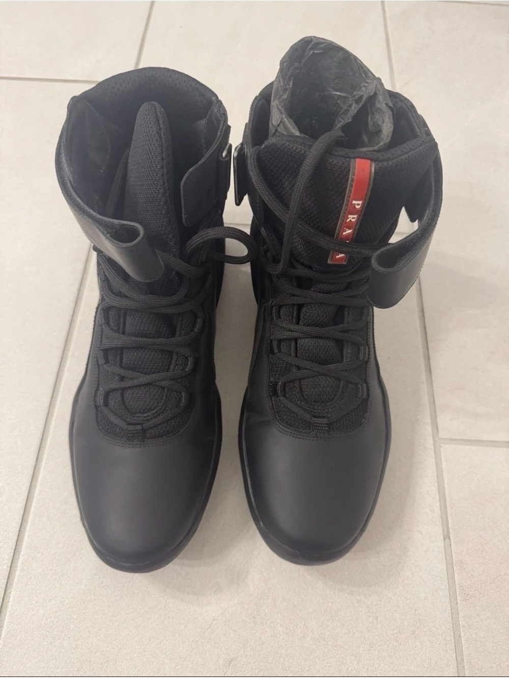 Prada Men’s Black High-Top Sneakers with Red Heel Accent